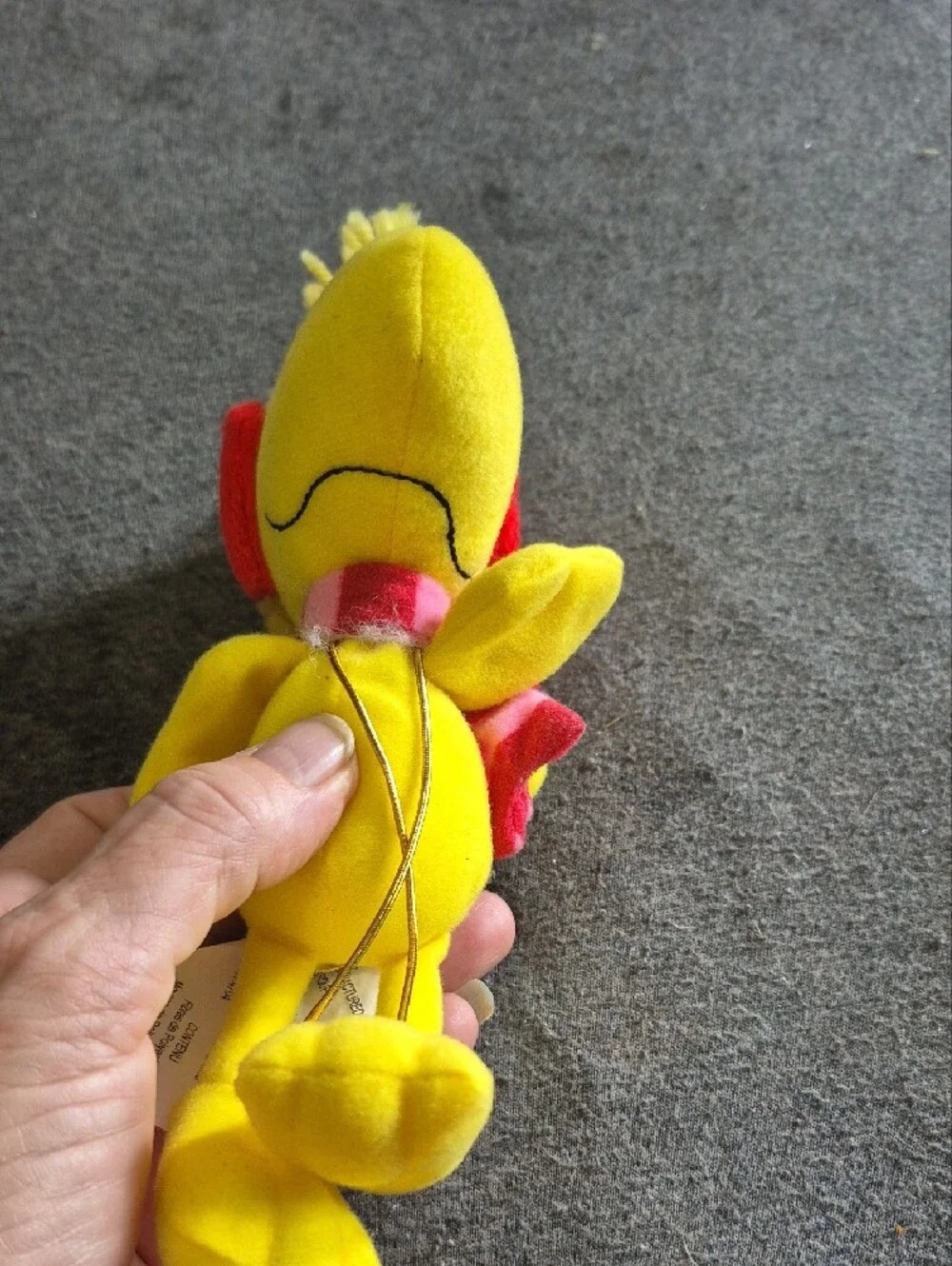 Peanuts Yellow Woodstock Plush with Pink Strap and Red Heart Earmuffs